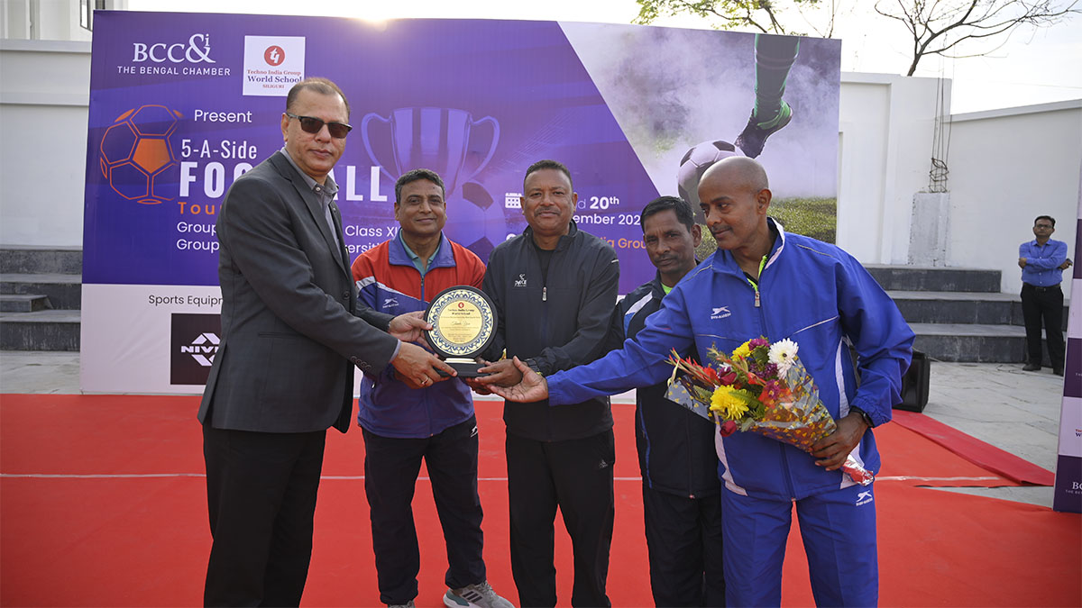 Referees being honoured by Mr. Bhaskar Roy, Vice President Techno India Group 