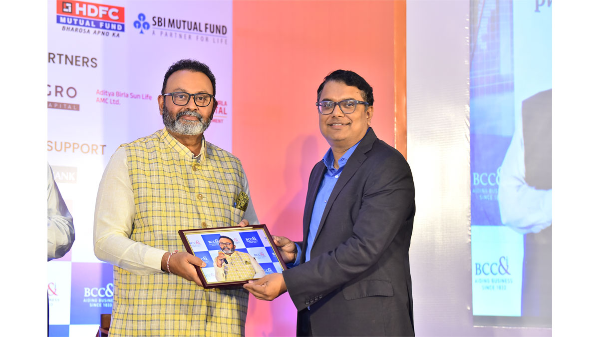 Mr. Arnab Basu, President Designate, BCC&I and Advisory Leader, PricewaterhouseCoopers Pvt. Ltd. presenting a memento to Mr. Madhav Nair, Country Head & CEO, Bank of Bahrain and Kuwait 